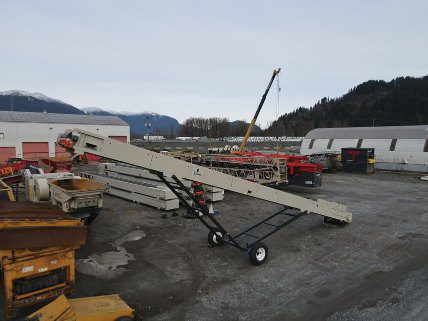 KPI/JCI stacking conveyor.